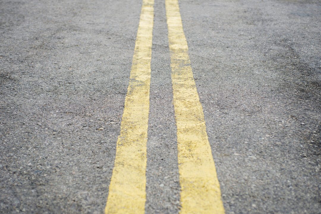 bigstock-Yellow-Double-Solid-Line-Road-390104578 | Alternatives Medical ...